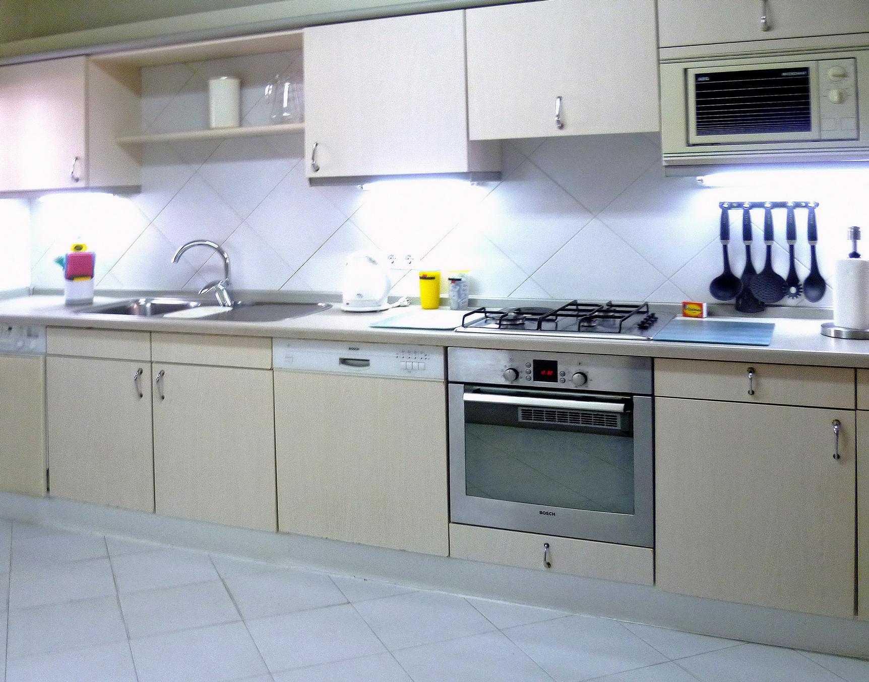 features fridge-freezer, dishwasher, washing machine, oven and hob ...